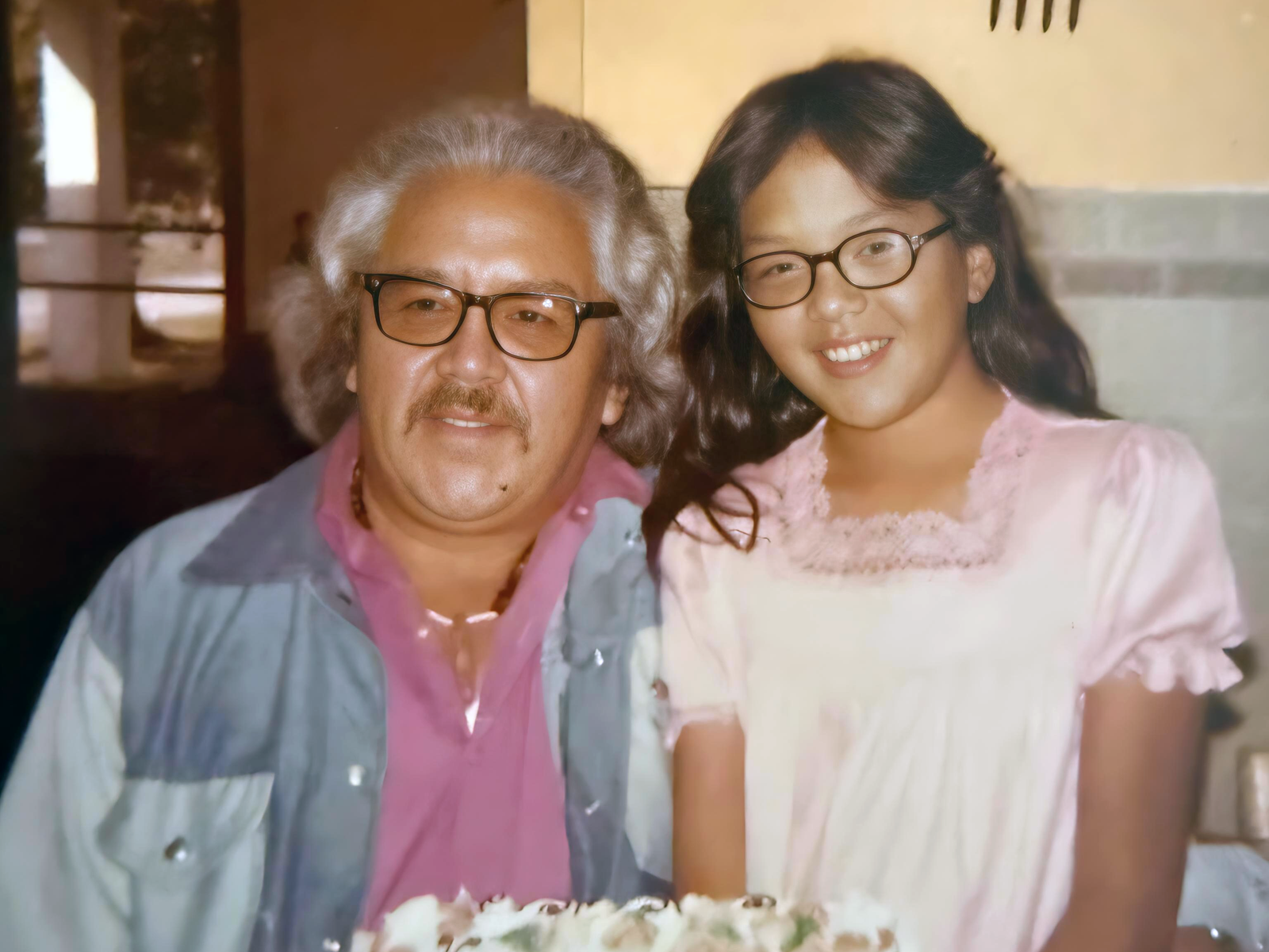 Francis Houle and Claudia Barkie celebrate Claudia’s birthday in 1976 or 1977, Spokane Valley, Washington.