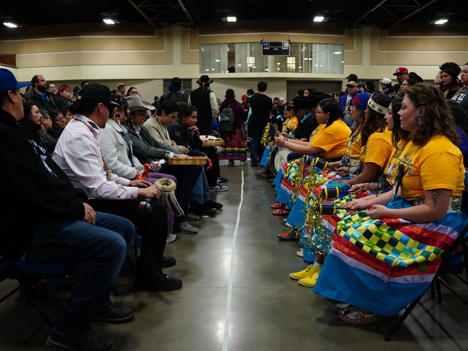 Two teams face off during the hand games tournament at the 2026 AIHEC conference, Bismarck, North Dakota.