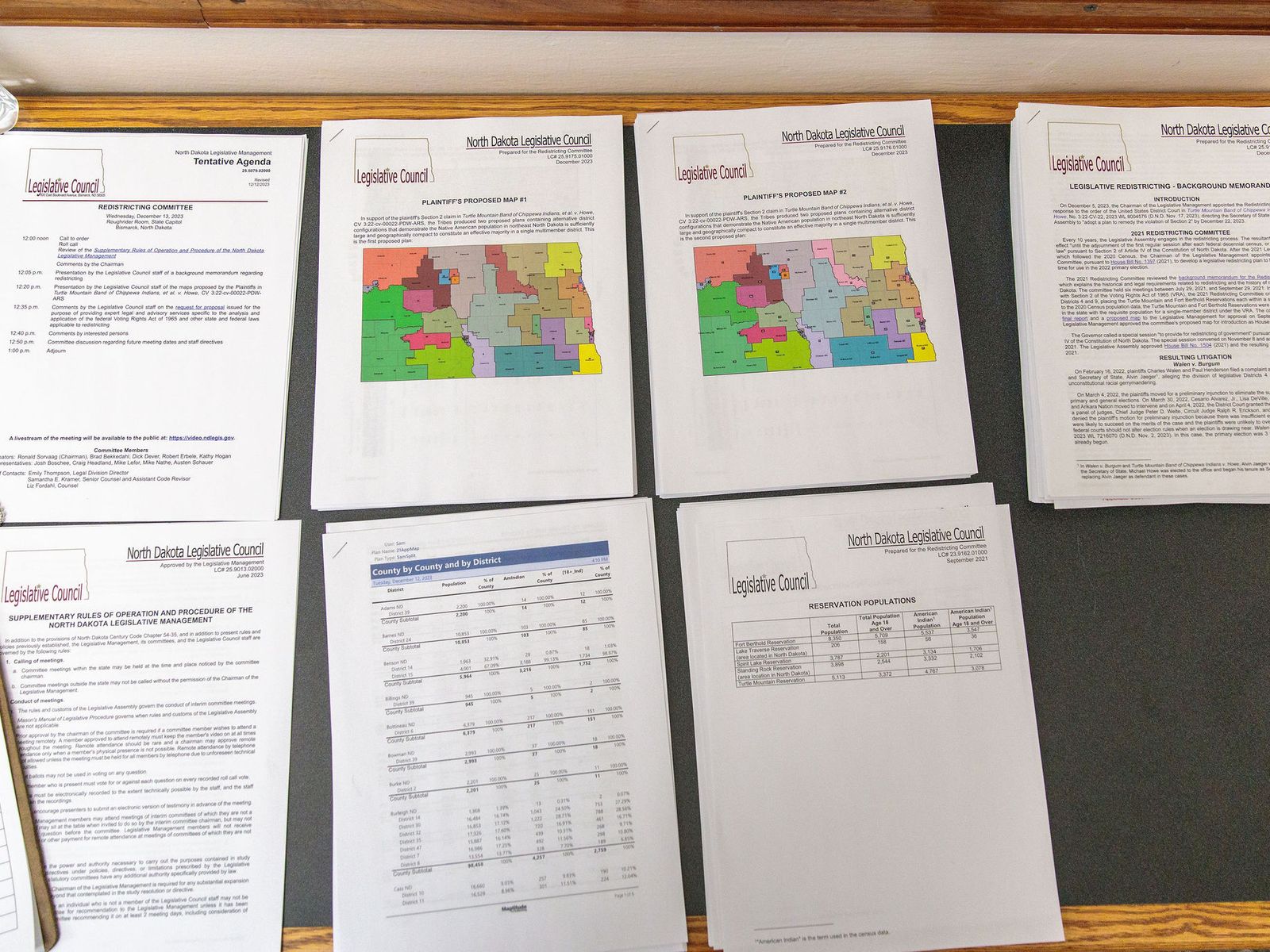 Maps discussed by a North Dakota legislative redistricting committee are displayed at a meeting in December 2023.