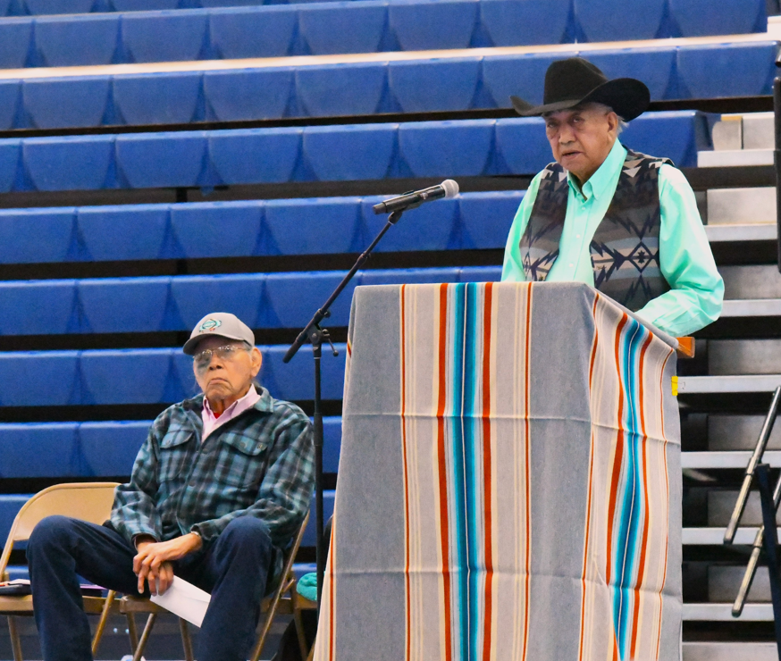 Emcee Dale Old Horn (at podium) and Walter Old Elk Sr., descendant of Crow scout Curley, at an April 2026 symposium discussing the history and context of the Native scouts who worked with Lt. Col. George Armstrong Custer in 1876.