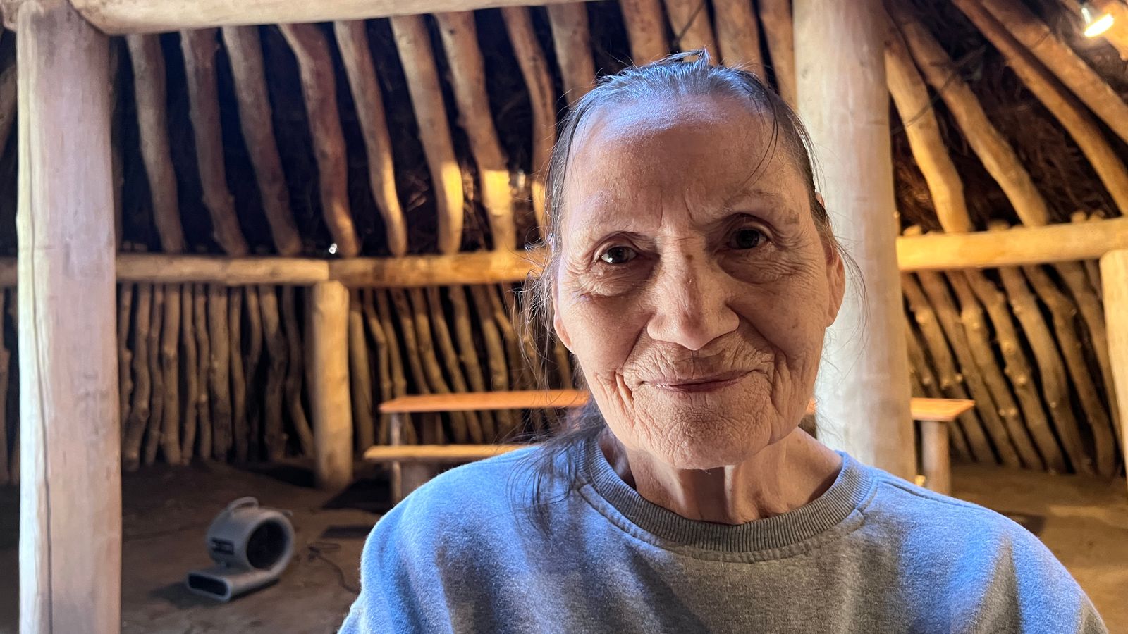 Marian Spotted Bear enjoys a visit at the On A Slant earth lodge village at Fort Lincoln State Park on May 26, 2025.