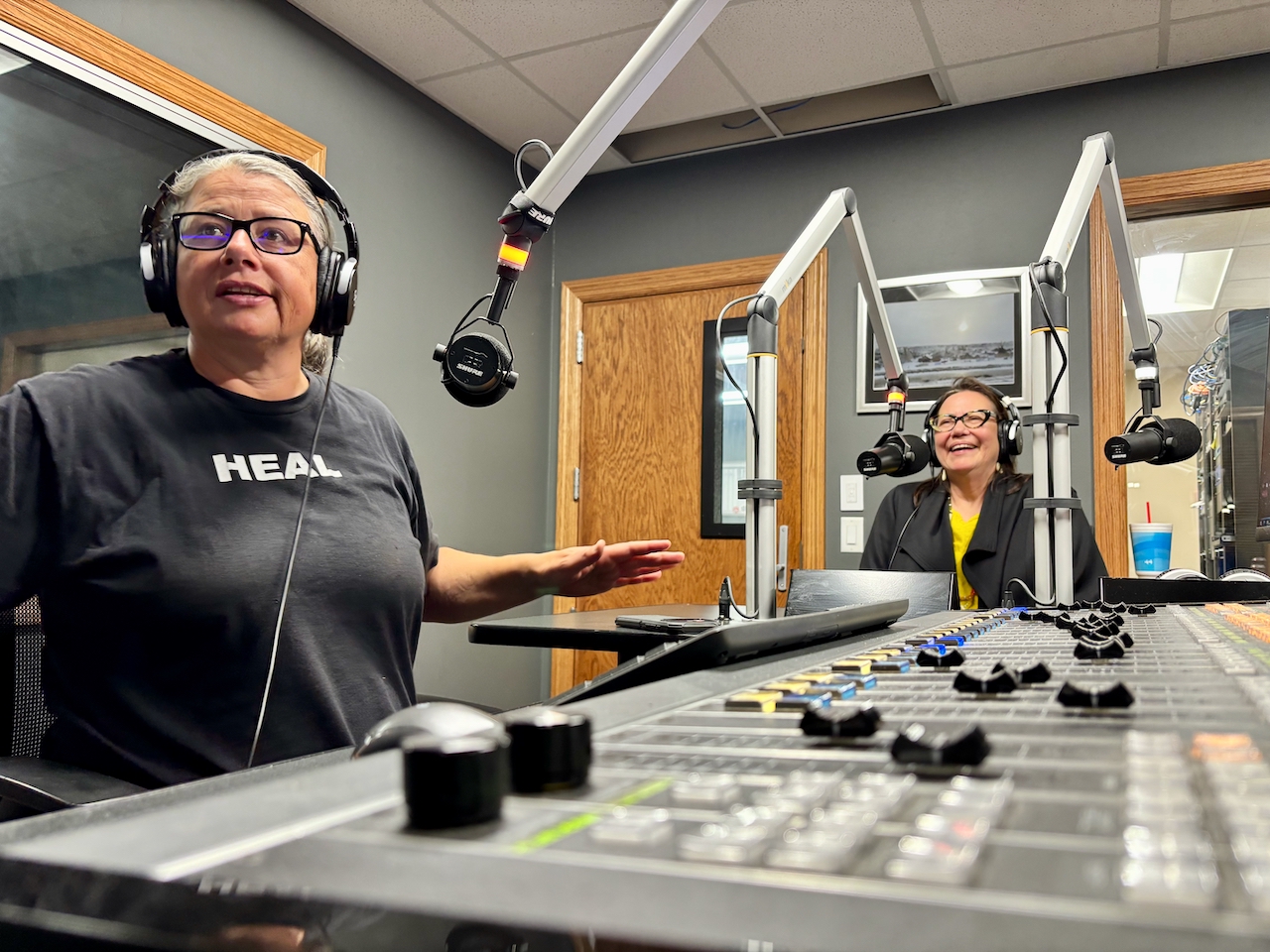 Chas Jewett, KIPI radio station manager (left), interviews Jodi Rave Spotted Bear after the Rez Tech Reimagined event in Eagle Butte, South Dakota.