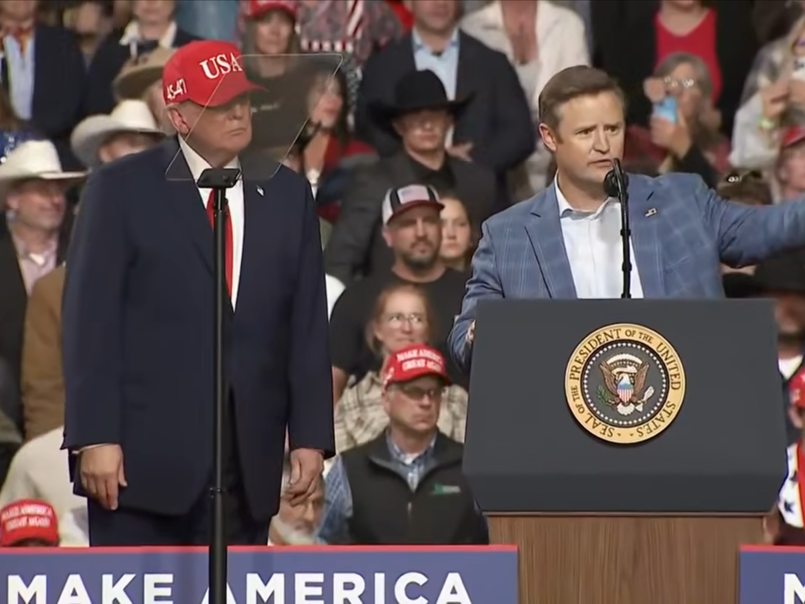 President Trump and congressional candidate Aaron Flint share the stage at a campaign rally in Kalispell, Montana, Wednesday, Oct. 14, 2026.