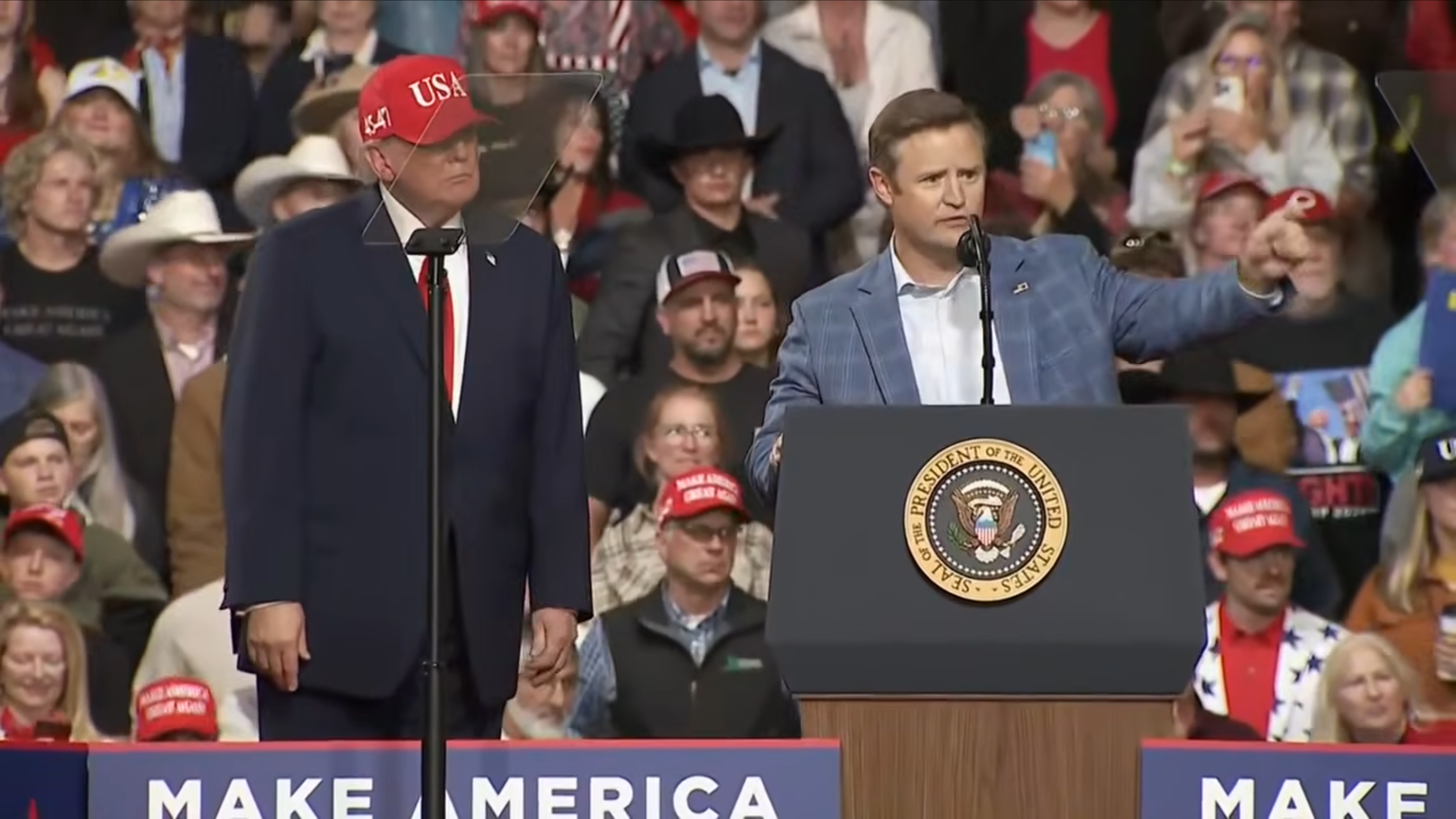 President Trump and congressional candidate Aaron Flint share the stage at a campaign rally in Kalispell, Montana, Wednesday, Oct. 14, 2026.