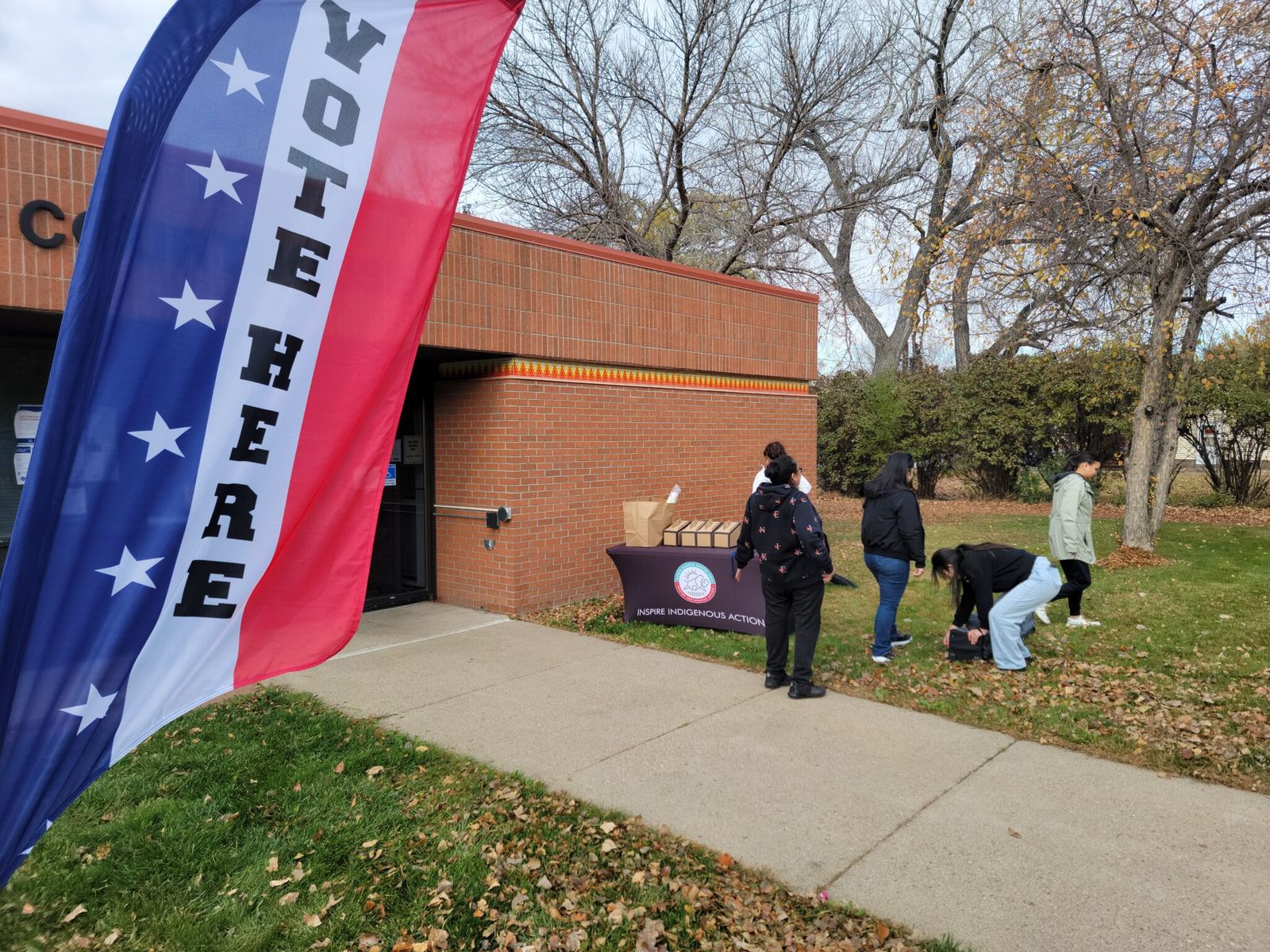 Volunteers from North Dakota Native Vote set up a booth outside the Sioux County Courthouse on Election Day, Nov. 5, 2024.