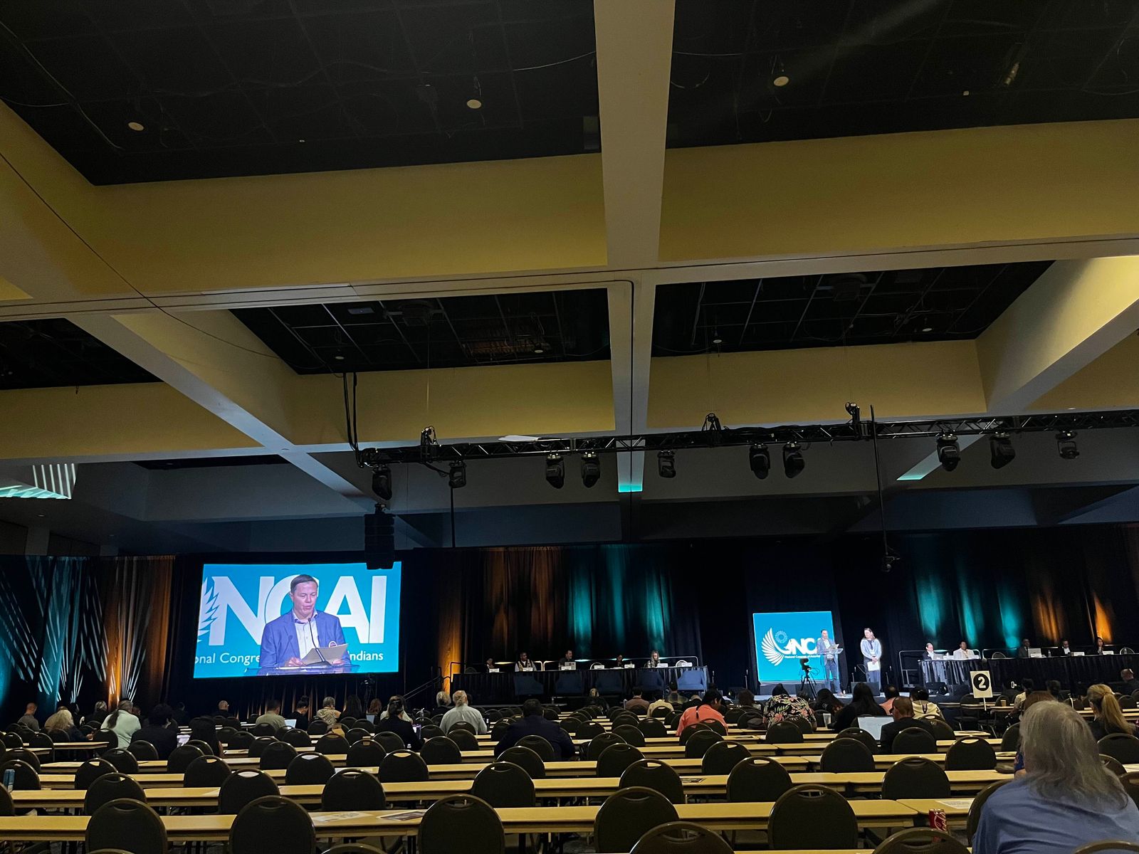 Matthew Campbell, chair of the NCAI Litigation and Governance Committee, presents the committee report to the general assembly.