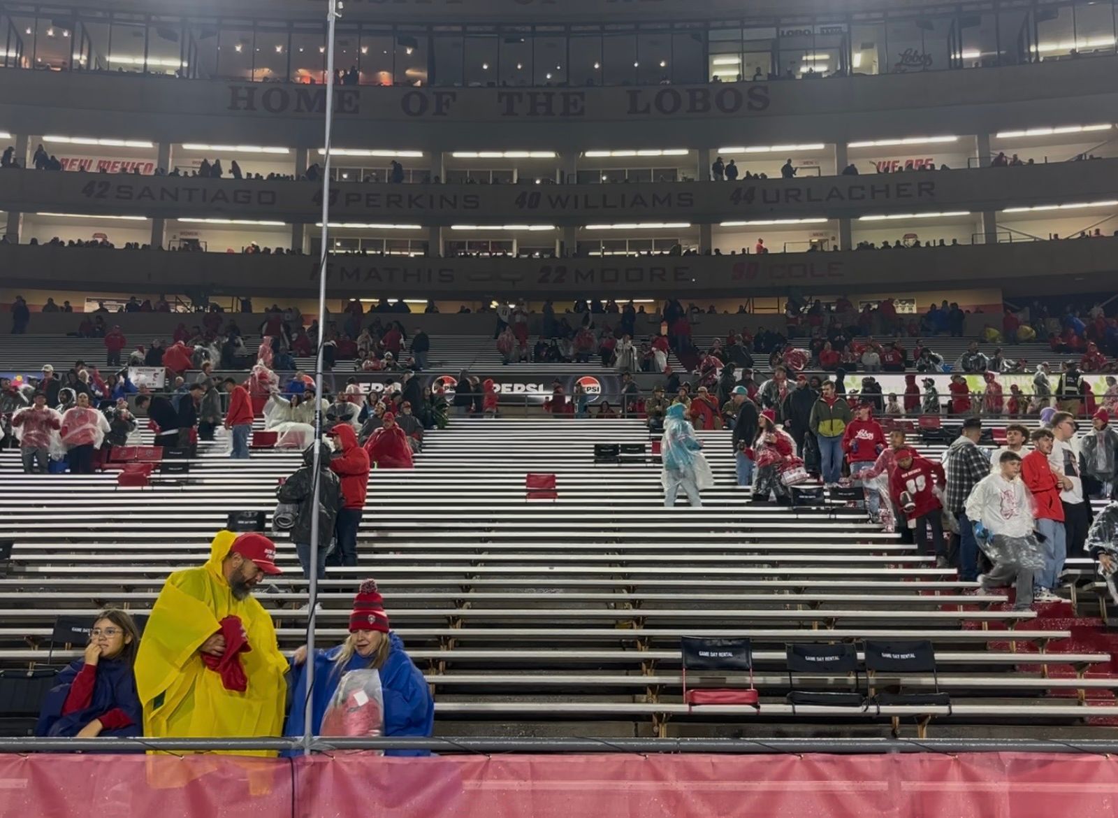 Fans reenter University Stadium after lightning delayed the start of kickoff between New Mexico and North Dakota State.