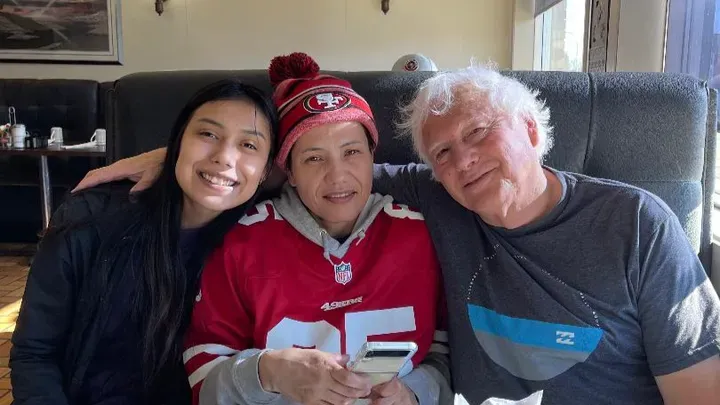 Alayzia Parisien, Kristin Bruce and Ron Delorme, who helped raise Kristin since she was a toddler, enjoy a family breakfast, March 2022. / Photo courtesy of Parisien