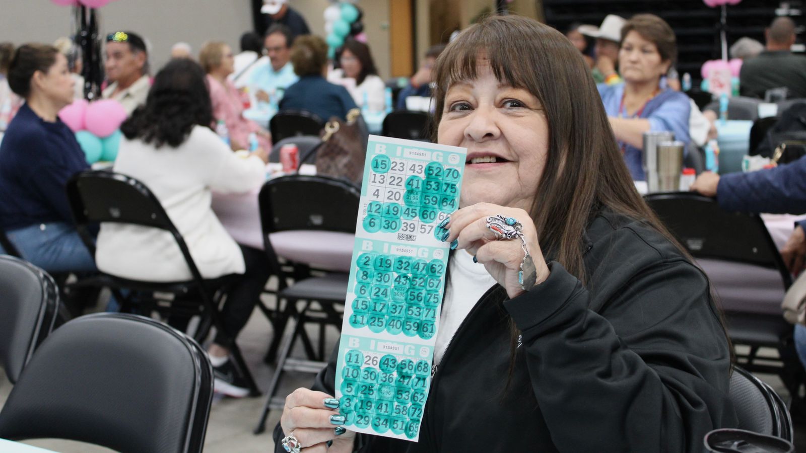 Dinah Belgarde was the first to cover every space on her bingo card in the second round of blackout bingo. She won $3,000.
