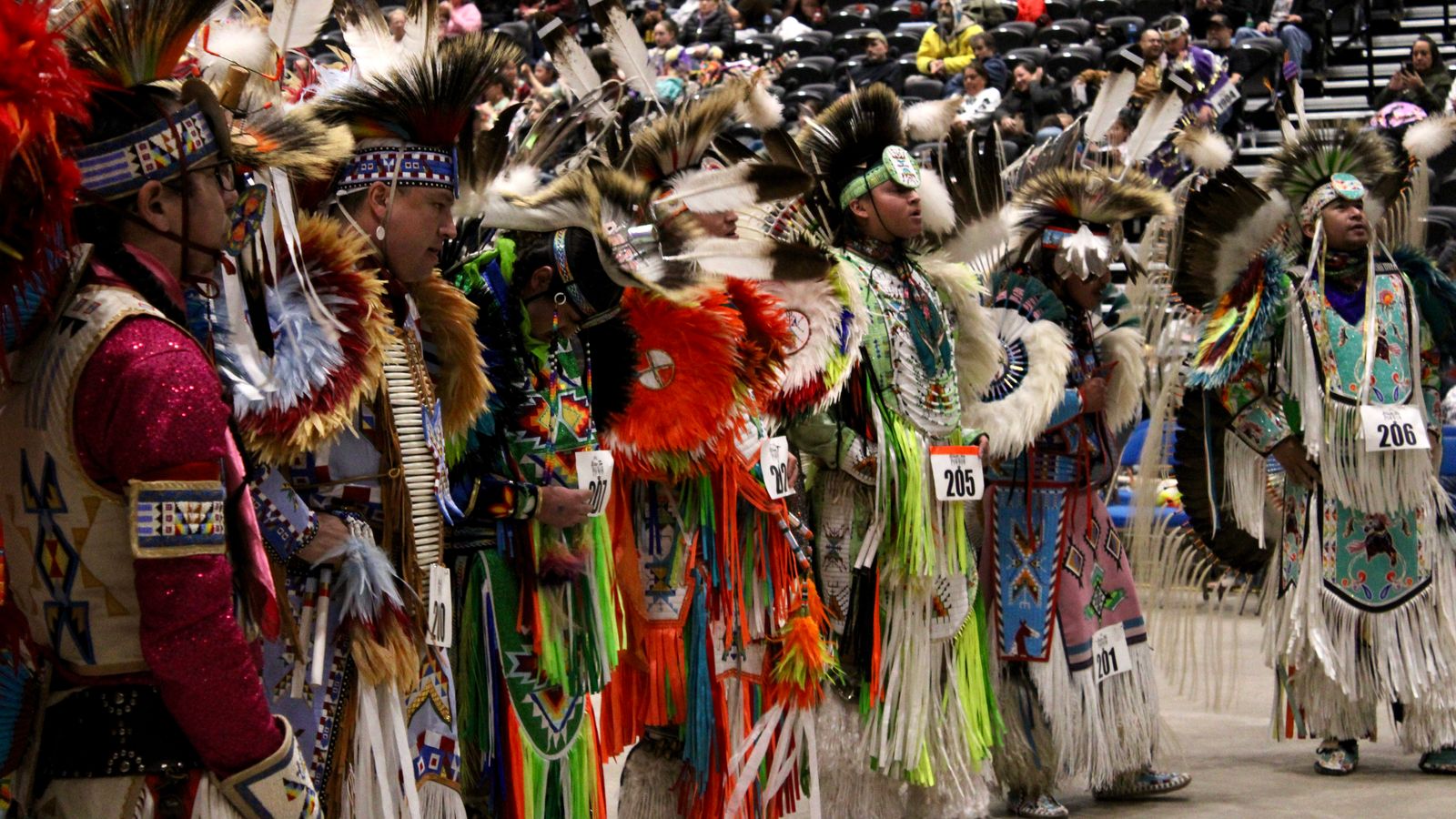 Powwow dancers stand in line for judging, Bismarck Event Center, North Dakota, Saturday, Jan. 24, 2026. (Gabrielle Nelson/Buffalo’s Fire)