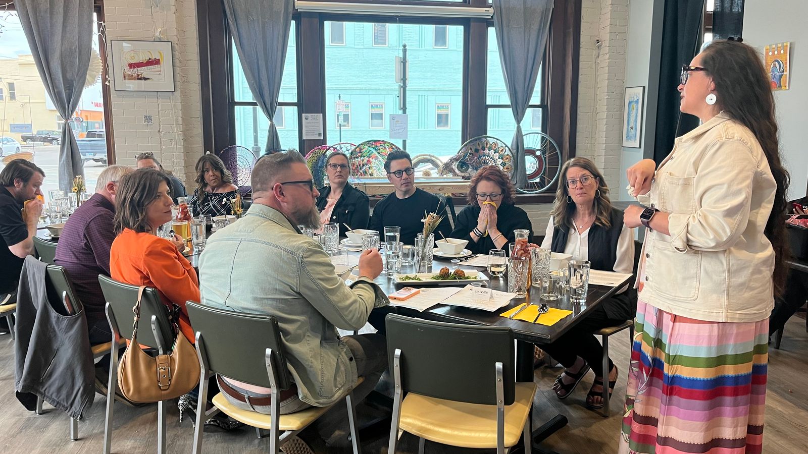 Ruth De La Cruz speaks between dinner courses about Native food traditions at Aurora Nights, Minot, North Dakota, Monday, April 28, 2025. (Prairie Sky Breads/Jazmine Schultz)