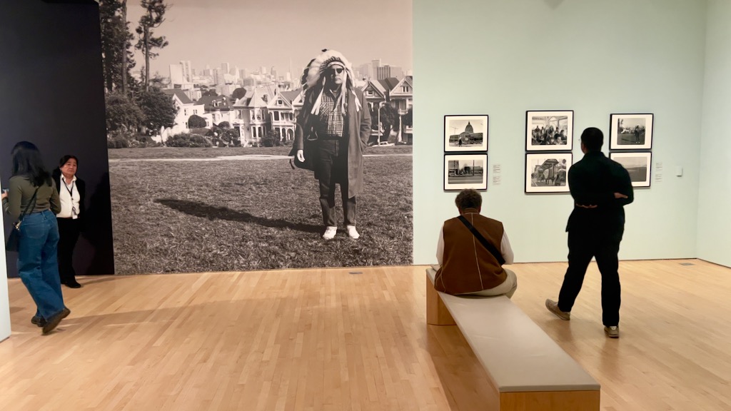 Zig Jackson, citizen of the Mandan, Hidatsa and Arikara Nation, is seen here larger than life in a self portrait on March 7, 2025, at the San Francisco Museum of Modern Art (Photo Credit: Jodi Rave Spotted Bear).