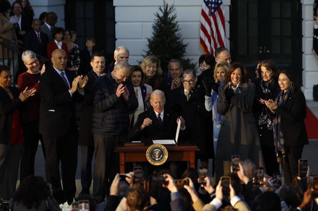 President Biden signs the Respect for Marriage Act during a ceremony on the South Lawn of the White House on Tuesday, Dec. 13, 2022. (Photo Credit: Ting Shen/Bloomberg)
