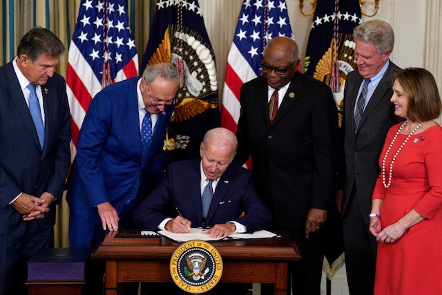 President Joe Biden signs the Inflation Reduction Act into law last month. While the law is a major investment in climate action, it also expands extractive activities that already regularly impact landscapes and wildlife that are critical for tribal cultural practices.
Yuri Gripas/Sipa via AP Images