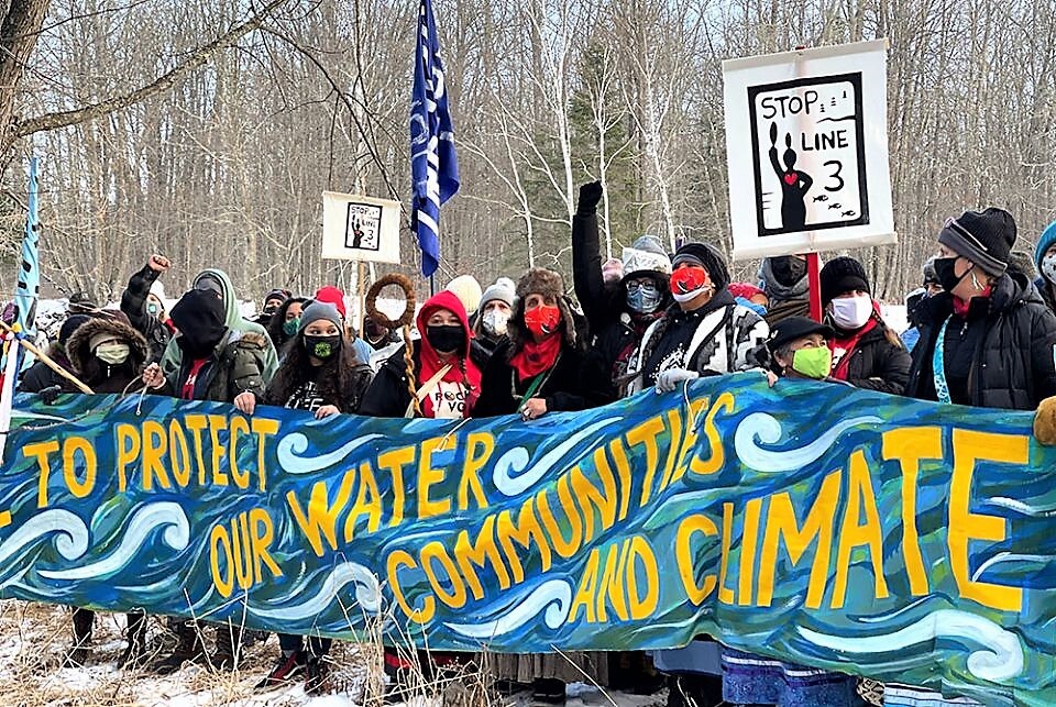 Photo by Sarah Little Redfeather – Honor the Earth Line 3 Movement participants in Minnesota display concerns shared with hazardous oil pipeline resisters from tribes in unceded North and South Dakota treaty territory.